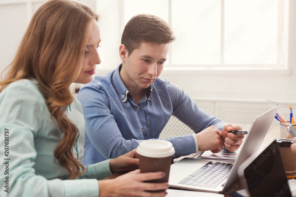 Programmers working in software developing company Programmers working in software developing company