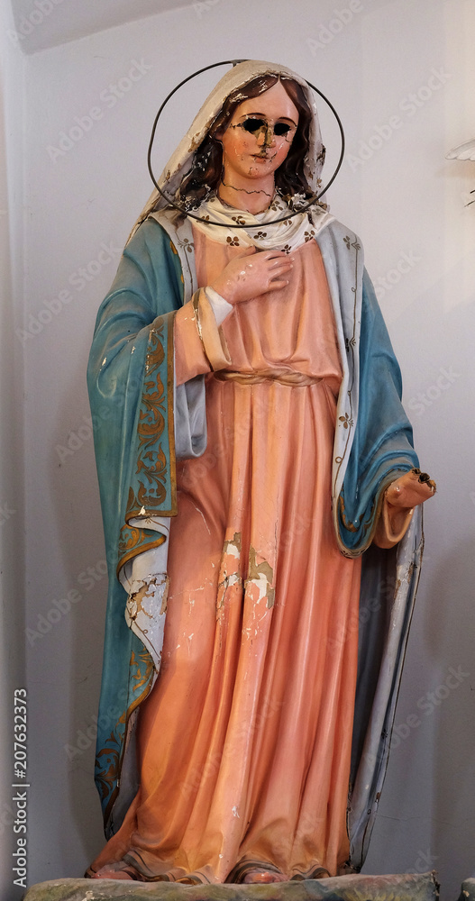 Virgin Mary with eyes gouged out, devastated on 13 January 1992 by Serbia and Montenegro invaders having previously burned Cilipi, Church of St. Nicholas in Cilipi Virgin Mary with eyes gouged out, devastated on 13 January 1992 by Serbia and Montenegro invaders having previously burned Cilipi, Church of St. Nicholas in Cilipi