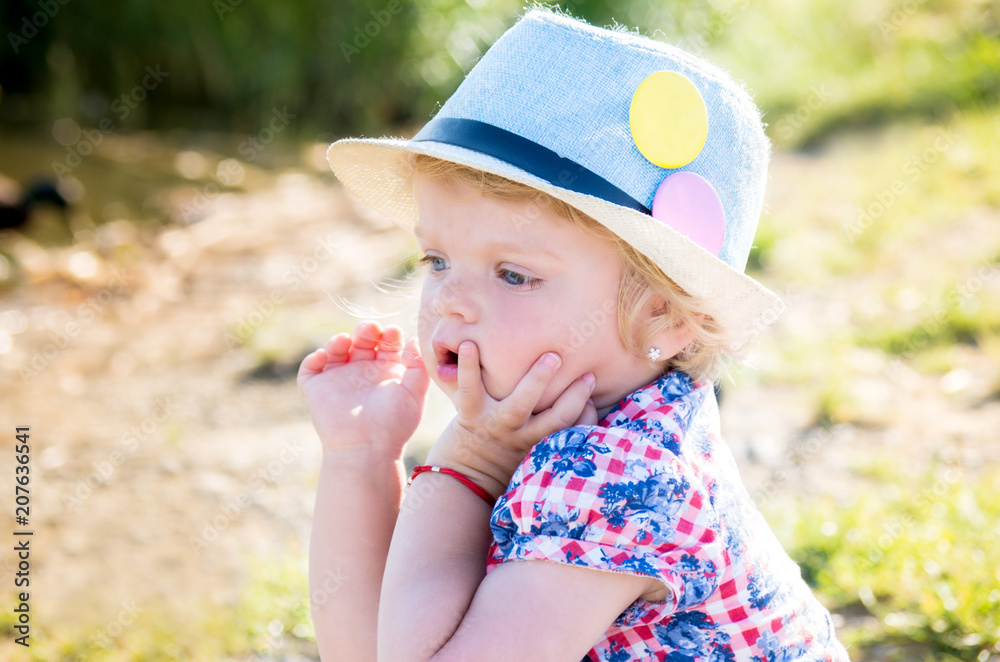 Portrait of a thoughtful girl with blue eyes in a headdress Portrait of a thoughtful girl with blue eyes in a headdress