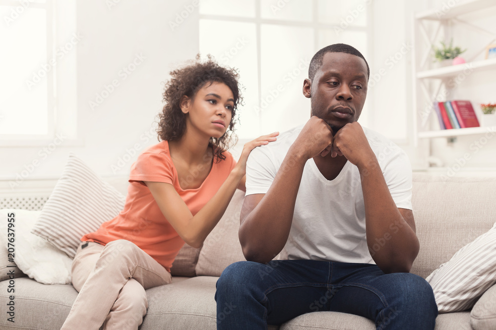 Young black couple quarreling at home Young black couple quarreling at home