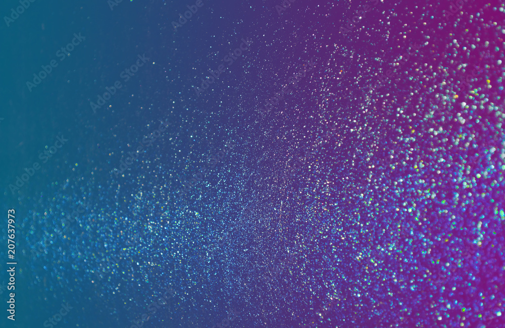 blue sparkling and shining star points on a gradient blue violet background and a blue bright flash will create a festive mood