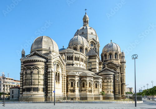 Obraz na płótnie Rear view of the cathedral of Marseille, Sainte-Marie-Majeure also known as La Major, a neo-byzantine style building achieved in 1893 in La Joliette district, showing cupolas, chapels and turrets. w salonie