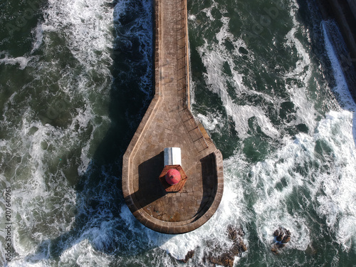 Top down view of lighthouse in the Atlantic - Porto, Portugal 2018