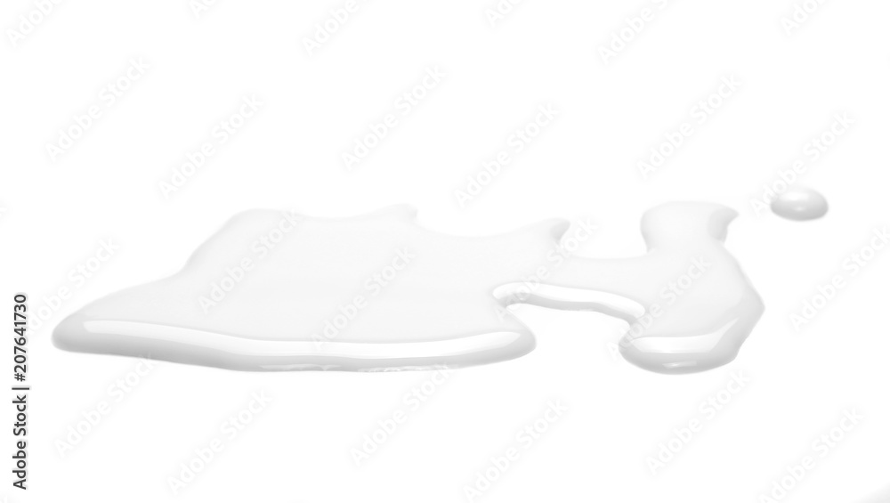 Spilled milk puddle isolated on white background and texture Spilled milk puddle isolated on white background and texture