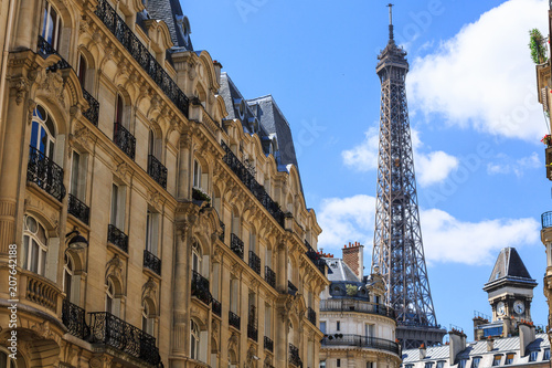 Fototapeta Naklejka Na Ścianę i Meble -  Paris rooftops against a backdrop of Eiffel Tower