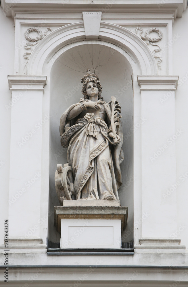 Saint Catherine of Alexandria statue on the facade of St. Catherine church in Zagreb, Croatia 