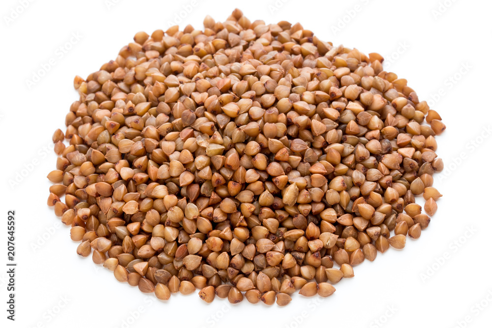 Fototapeta premium Buckwheat grains isolated on the white background.
