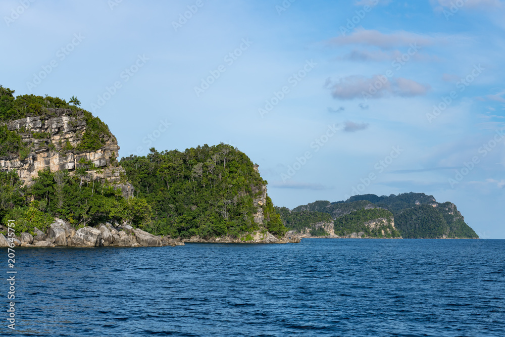 East Misool, group of small island in shallow blue lagoon water, Raja Ampat, West Papua, Indonesia