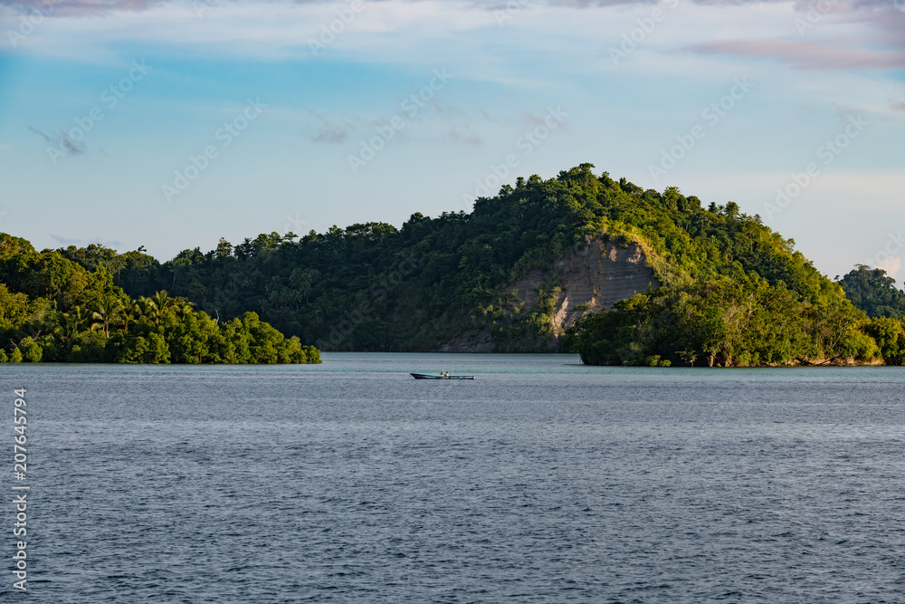 East Misool, group of small island with fishermen in shallow blue lagoon water, Raja Ampat, West Papua, Indonesia East Misool, group of small island with fishermen in shallow blue lagoon water, Raja Ampat, West Papua, Indonesia