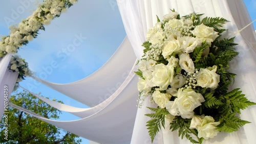 Beautiful video 4k of the Jewish Hupa.Closeup on a bouquet from roses photo