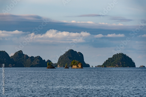 East Misool, group of small island in shallow blue lagoon water, Raja Ampat, West Papua, Indonesia photo