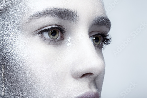 Closeup beauty portrait of young woman face