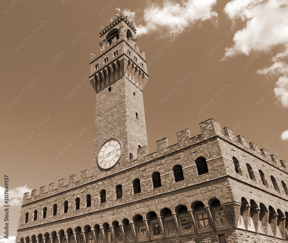 Obraz premium Florence in Italy The Old Palace and clock tower with blue sky with spia effect
