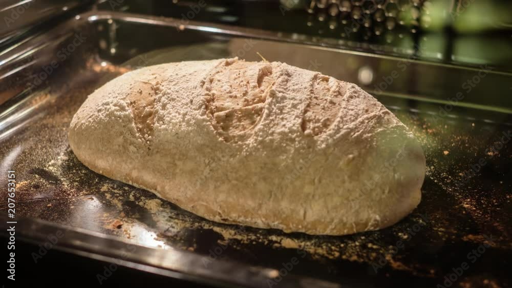 Time laspe footage of sourdough bread being baked in oven