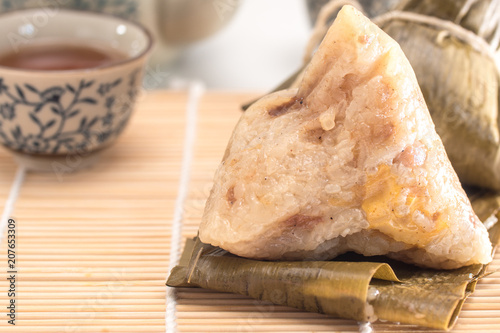 Zongzi - Traditional Dragon Boat Festival dumpling. Hand drawn watercolor painting isolated on white background.