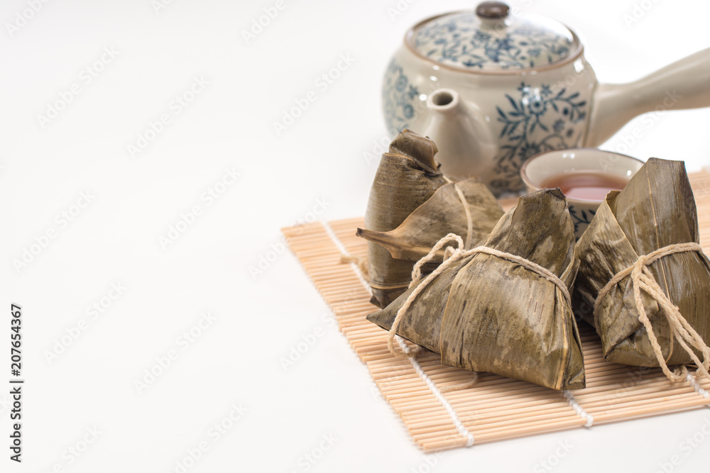Zongzi - Traditional Dragon Boat Festival dumpling. Hand drawn watercolor painting isolated on white background.