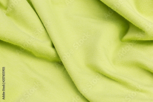 green jersey material knitted fabric background