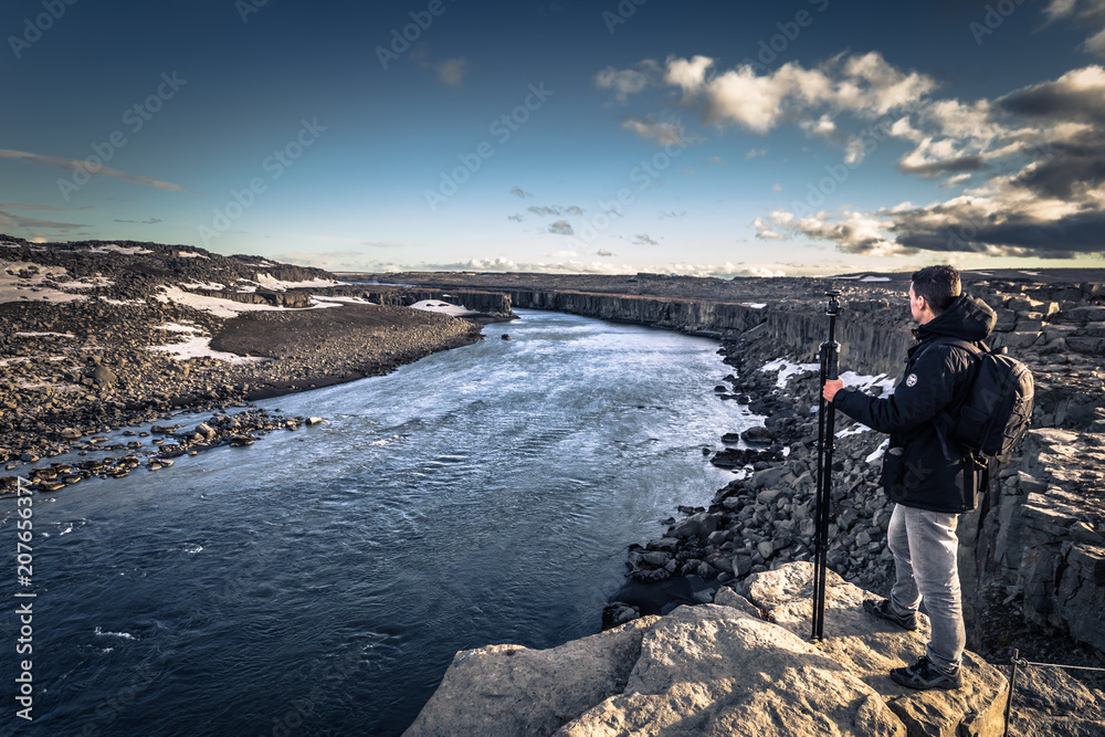 Fototapeta premium Selfoss waterfall- May 06, 2018: Traveler in Selfoss waterfall, Iceland