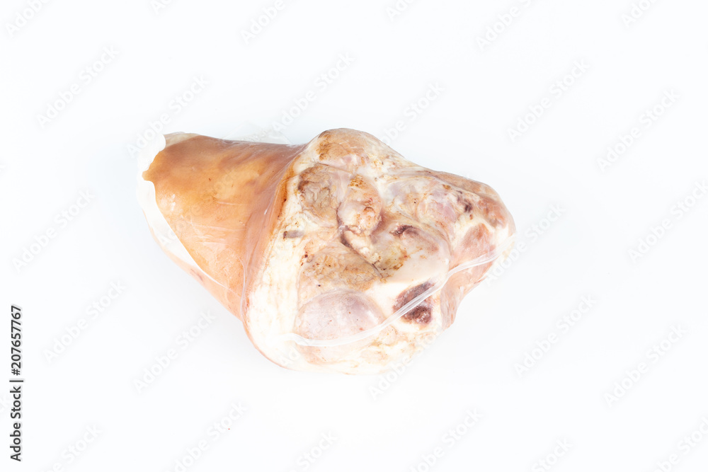 A raw pork hock wrapped by plastic.