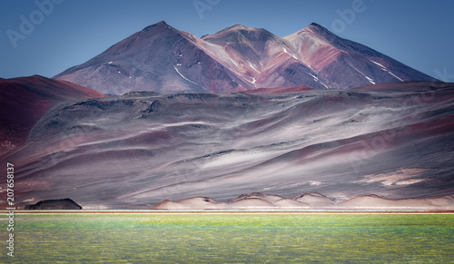 Caichinque volcano from Salar de Talar, near Aguas Calientes, in the Antofagasta region, the northern limit of the Puna of Atacama, San Pedro de Atacama, Chile photo