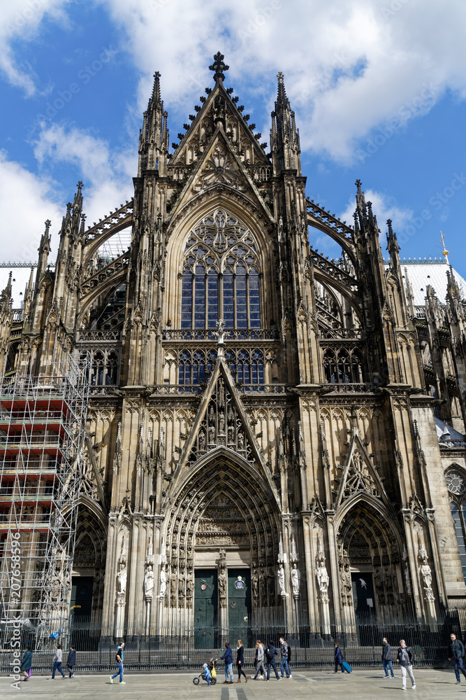 The southern portal of the Cathedral at Cologne, Germany as three entrances:
To the left is the portal of St. Ursula, in the middle the passion portal and to the right is the portal of St. Gereon.