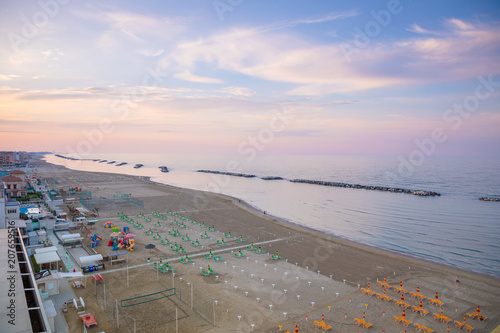 Fotografia A beach in Adriatic sea in Rimini at sunset time in Italy