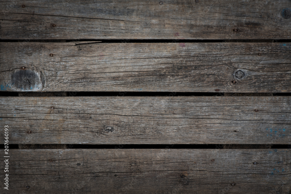 Fototapeta premium Natural grey burn out aged wood background texture. horizontal. vignette