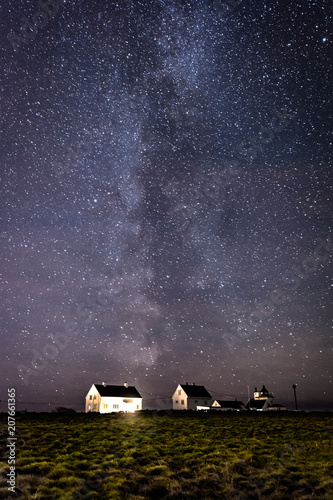 Milky way over farm in Norway