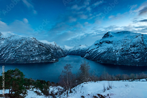 Geiranger fjord in winter snow landscape