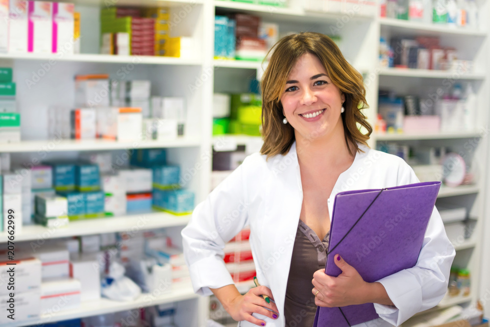 Woman customer with a folder in the pharmacy Woman customer with a folder in the pharmacy
