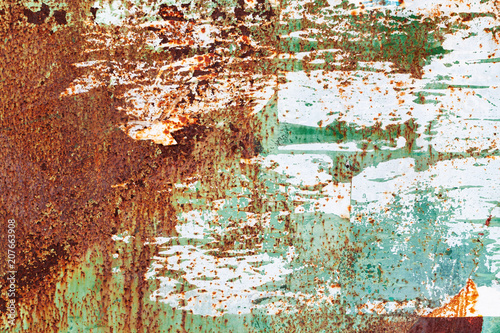 Old grunge metal wall with peeling paint