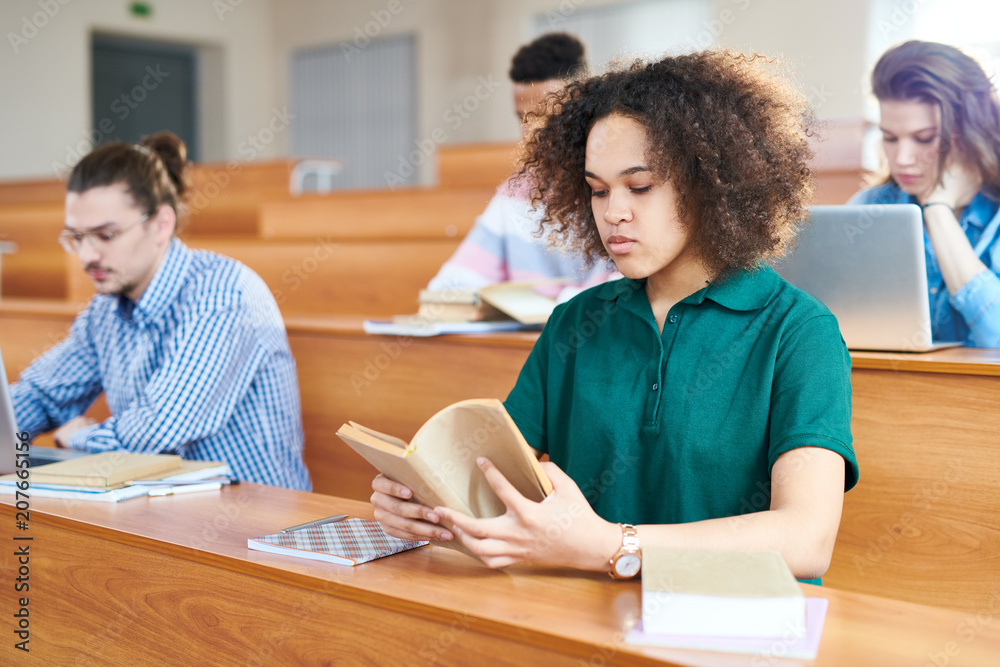Group of students sitting on exam at school Group of students sitting on exam at school
