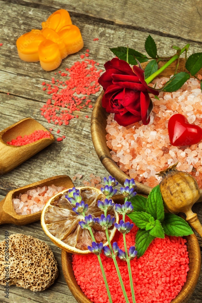 Bath salt on a wooden board. Rest after work. Stress treatment. Home Bath. Aromatherapy.