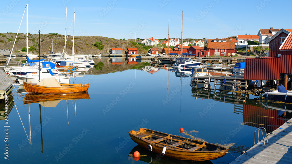 The marina at Halleviksstrand village on Orust, Sweden, on a windless and calm morning.
