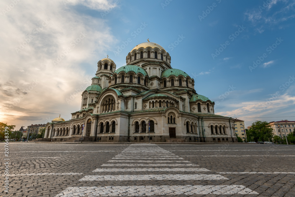 St. Alexander Nevsky Cathedral in the center of Sofia, capital of Bulgaria against the blue morning sky .