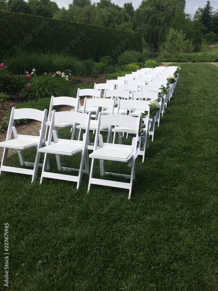 white chairs for wedding ceremony in garden white chairs for wedding ceremony in garden