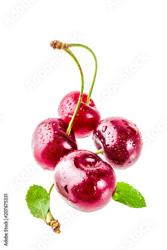 Raw fresh cherry with water drops, simple pattern isolated on white background