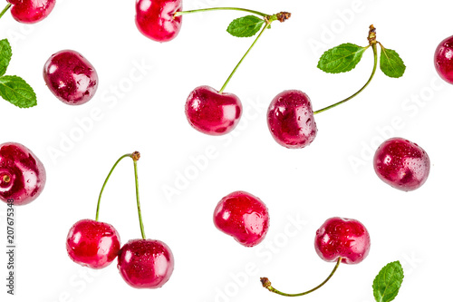 Fotobehang Raw fresh cherry with water drops, simple pattern isolated on white background