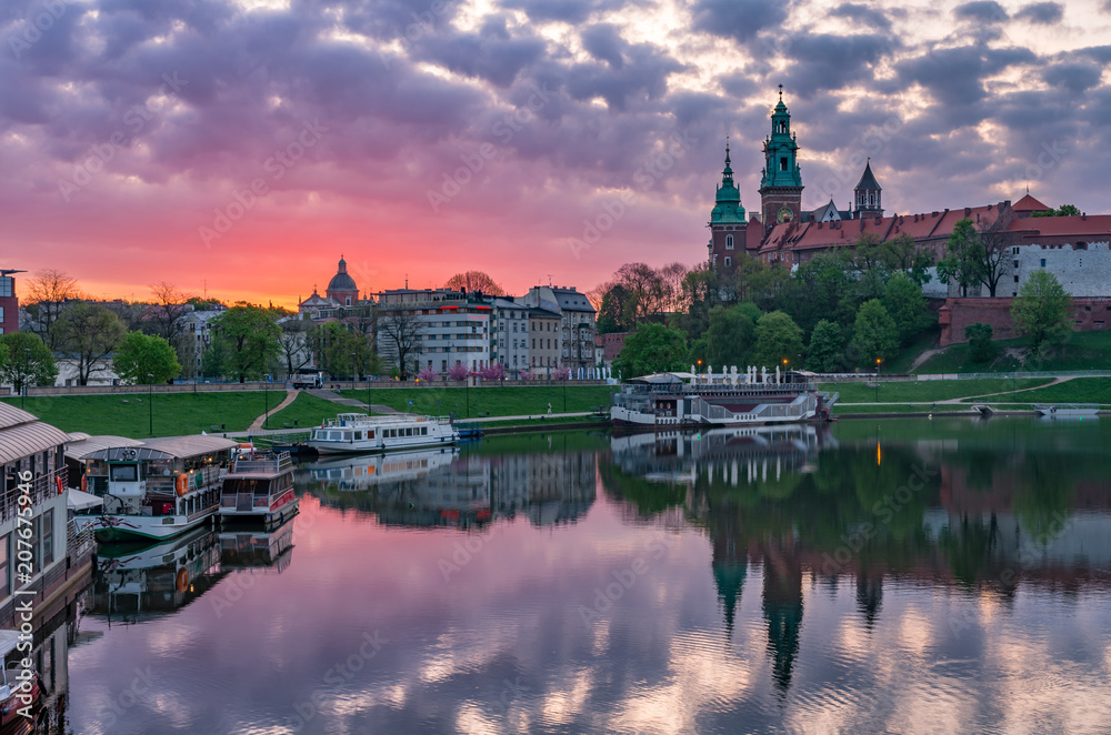 Wawel Castle in Krakow, Poland, seen from the Vistula boulevards in the colorful morning