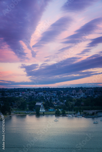 beautiful sunset clouds over the city © leonw302