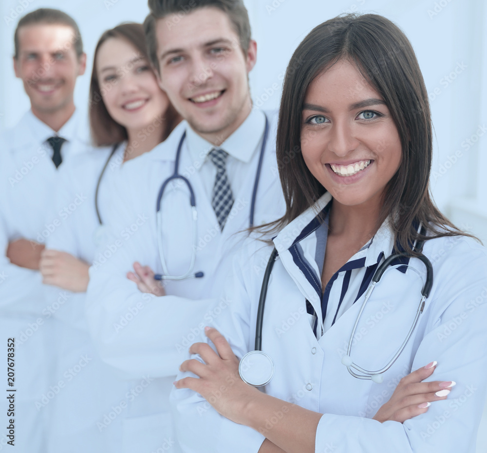 female doctor with group of happy successful colleagues female doctor with group of happy successful colleagues