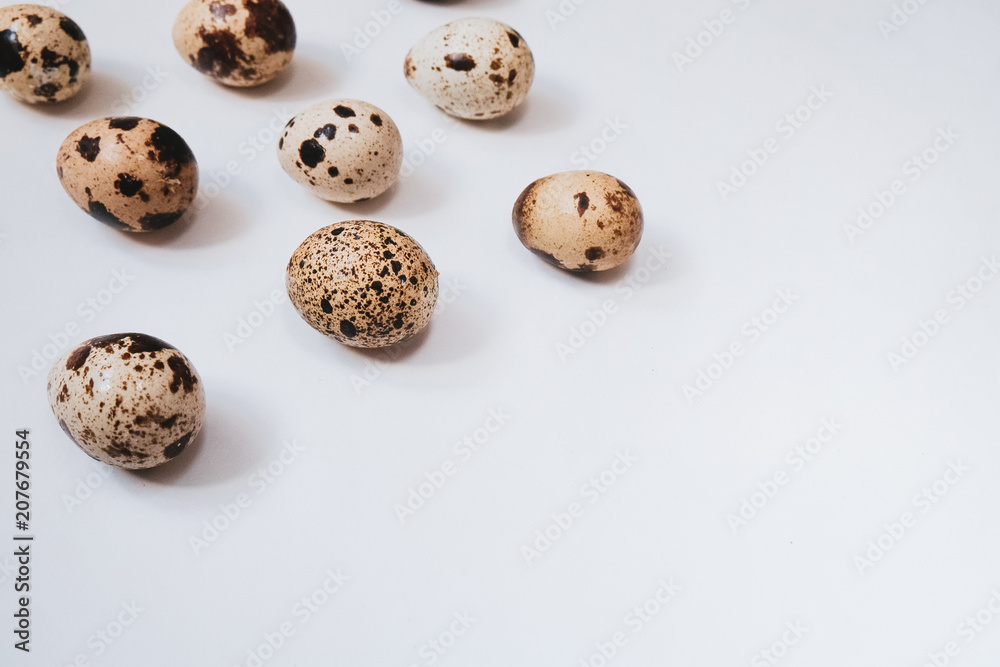 Fresh quail eggs on white background