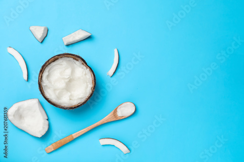 Flat lay composition with coconut oil on color background. Healthy cooking
