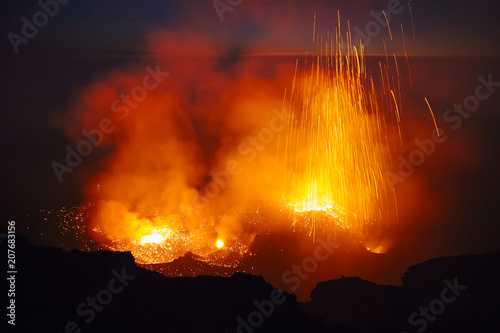 Stromboli volcano eruption at sunset