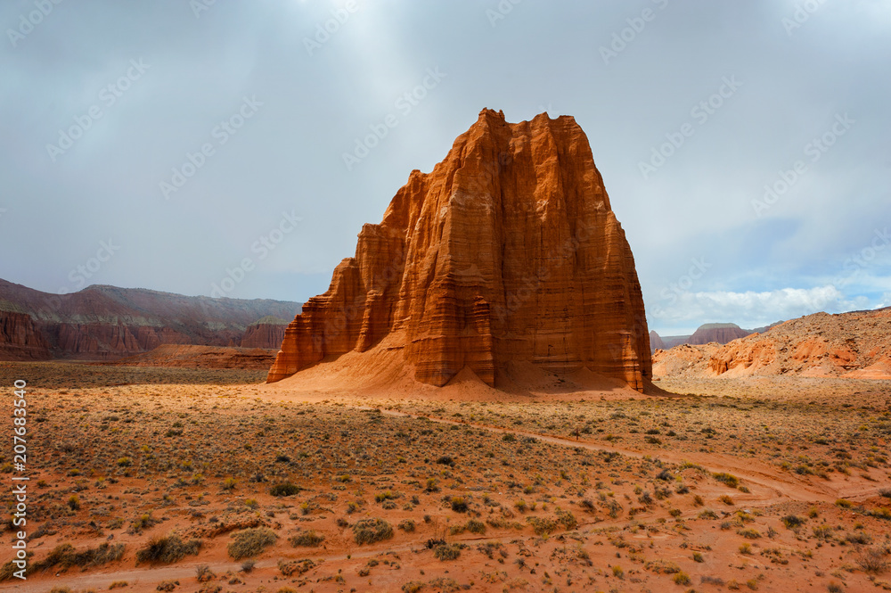 Temple of the Sun, Capitol Reef National Park, Utah. A remote, stark desert characterized by amazingly beautiful sandstone monoliths that some say resemble cathedrals.