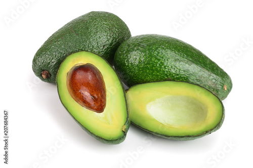whole and half avocado isolated on white background close-up. Top view