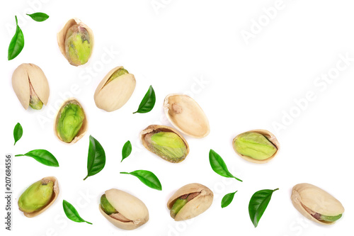 Pistachios with leaves isolated on white background with copy space for your text, top view. Flat lay pattern