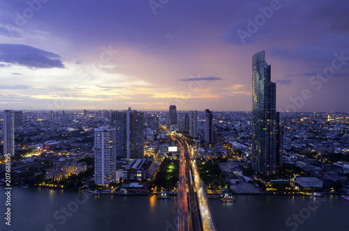 Aerial view of Bangkok modern office buildings, condominium, living place in Bangkok city downtown with sunset scenery, Bangkok is the most populated city in Southeast Asia.Bangkok , Thailand