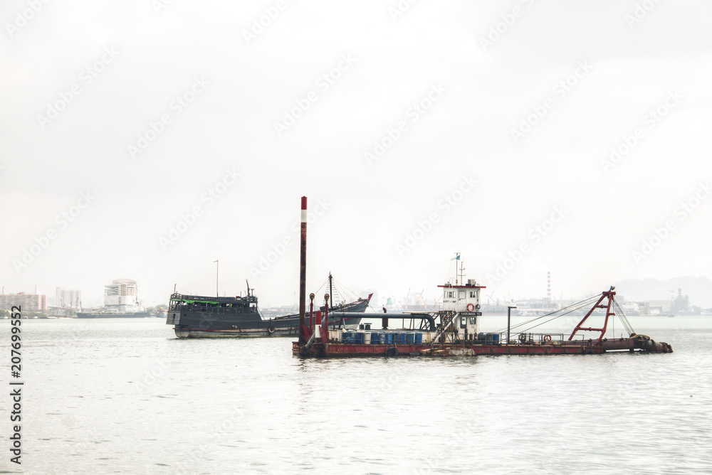 Boats at the coast of Penang, Malaysia.