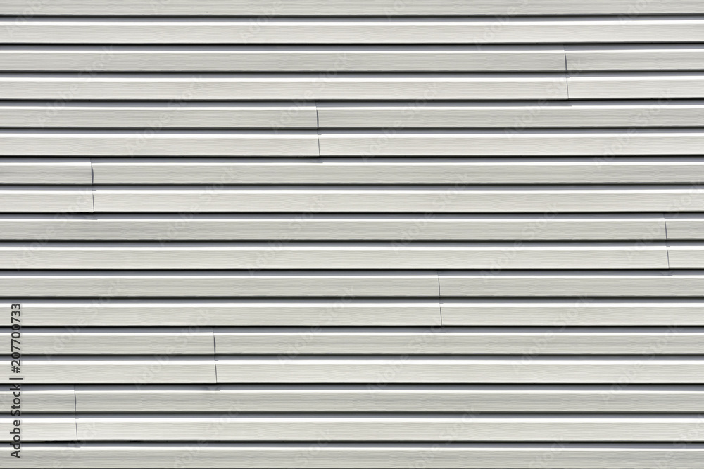 wall lined with beige siding wall lined with beige siding
